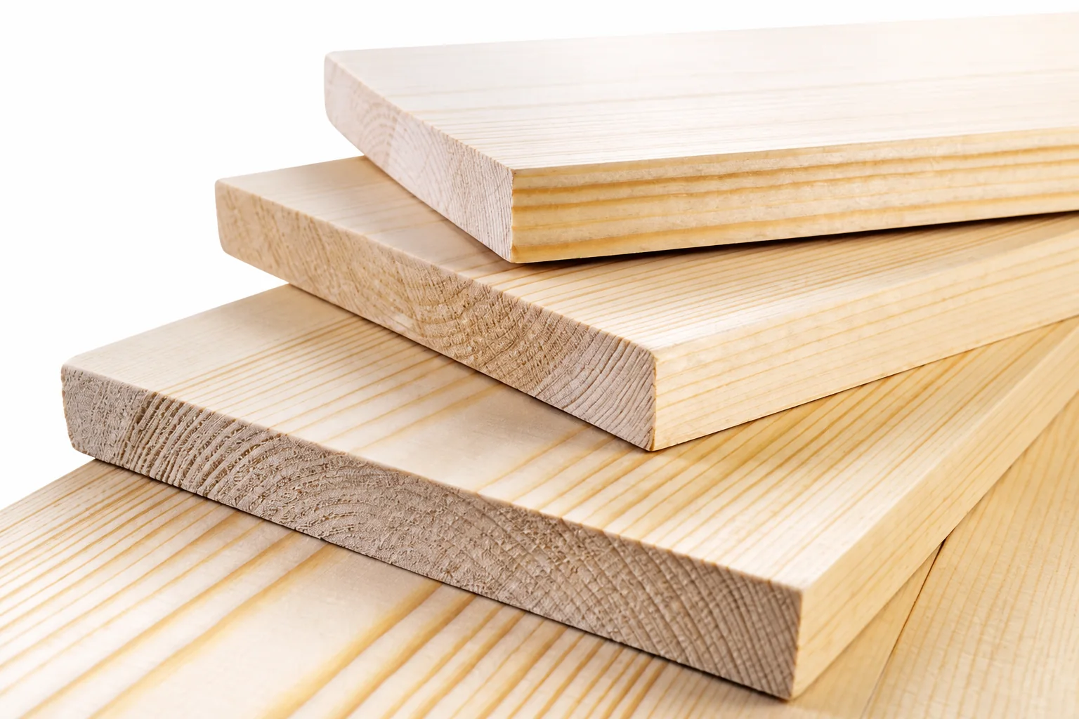 Stacked solid wood boards showing natural grain and end grain