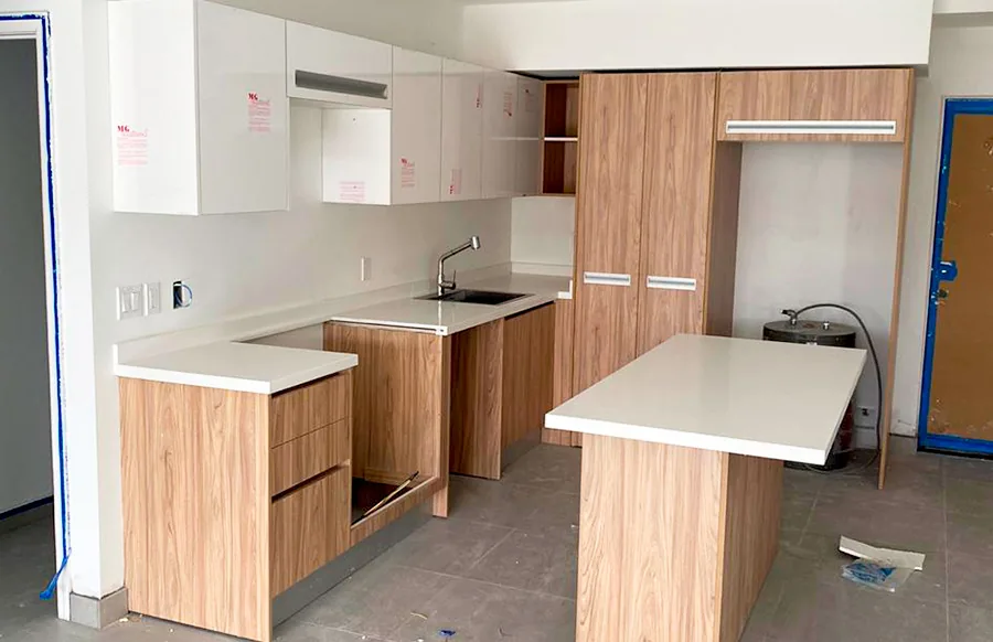 Wood-tone kitchen cabinetry in an Aruba waterfront residence