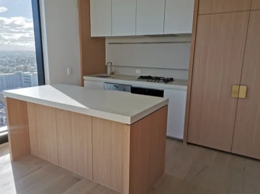 Timber-tone compact kitchen and storage cabinetry in Melbourne