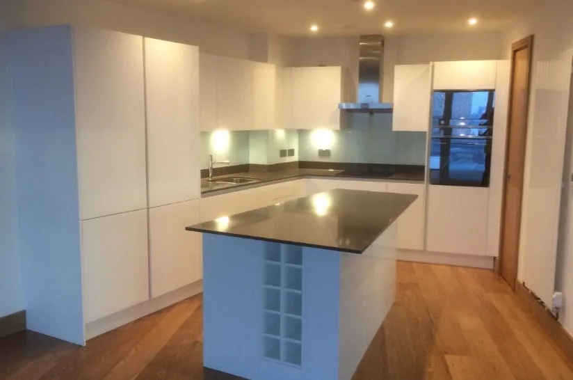 Lacquer kitchen cabinetry in a London high-rise apartment