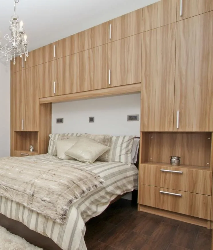 Timber-finish fitted wardrobe in a London apartment