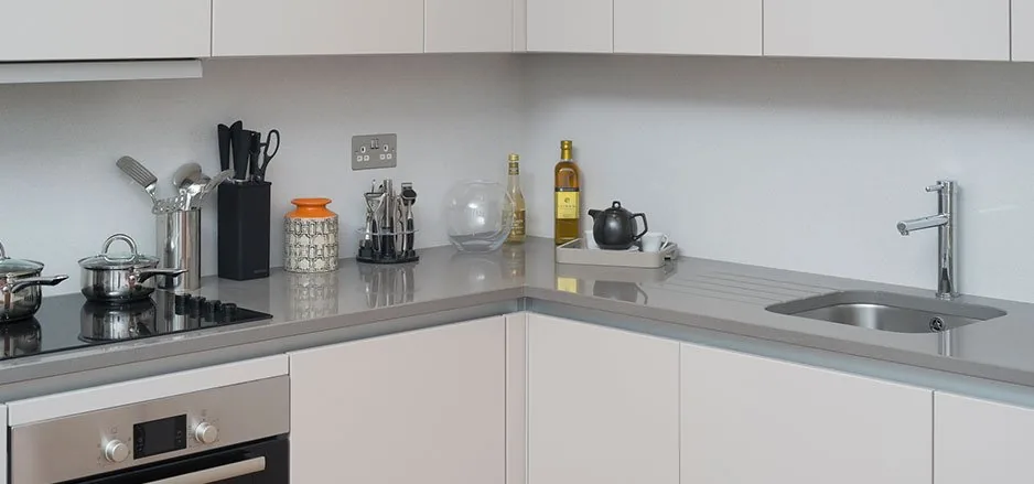 Compact white kitchen in a converted London residential building