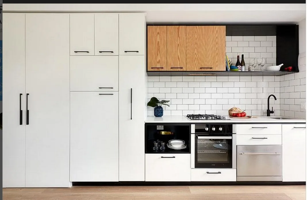 White and timber kitchen cabinetry in a Melbourne residence
