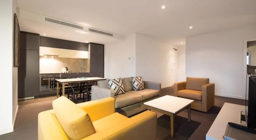 Open-plan kitchen cabinetry in a Melbourne apartment
